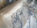 Calacatta Viola Marble Wall-mount Bathroom Vanity carved from Solid Block (W)20" (L)52" closeup edge