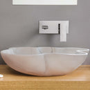 Carrara White flower shape farmhouse sink NTRVS03 W18 L24.5 designer installed above wooden vanity bathroom chrome wall-mount faucet
