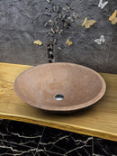 Karina walnut travertine natural stone oval shape vessel sink honed and filled w16 l205 h6 SPKWTNS19 product shot top view_2