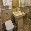 Troia Light Travertine Pedestal Stand-alone Sink Honed and Filled (W)19" (L)26" (H)33.5" installed hotels bathroom emperador marble on walls and travertine 3x6
