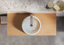 Troia Light Travertine Natural Stone Above Vanity Tapered Bathroom Sink (D)16" (H)6" installed above wooden vanity and brute sofas inside a bowl