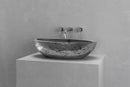 Oval vessel sink