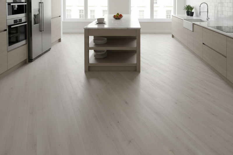 Modern kitchen with light wood flooring and white walls