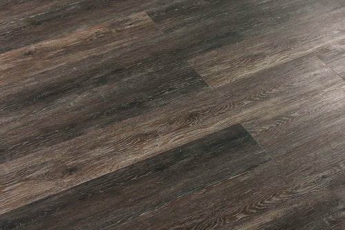 Close-up of a wooden floor with a dark brown finish