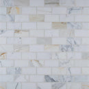 Calacatta gold 12X12 polished marble mesh mounted mosaic tile SMOT-CALAGOLD-2X4P product shot multiple tiles top view
