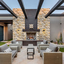 DaVinci 3D Onyx Travertine Ledger 3D Panel 6"x24" Honed and Split-face mixed Natural Wall Tile installed around fireplace outdoor furniture set with 3 coffee tables 