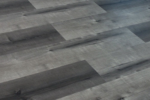 WPC Vinyl Rigid Core 7" Width 48" RL 8.5mm Thick, 1.5mm IXPE, Hamilton Grey, Bermuda Floors - Mazzia Collection plank angle view