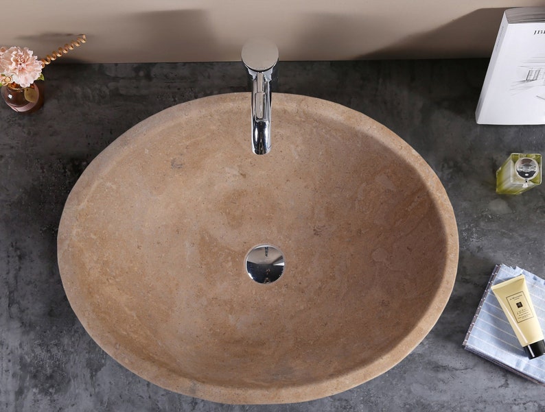 Karina walnut travertine natural stone oval shape vessel sink honed and filled w16 l205 h6 SPKWTNS19 room shot sink view