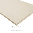 Beige foam pad with a thickness measurement label on a white background