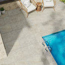 Outdoor patio with tiled flooring and a pool area