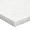 White foam mattress topper on a white background