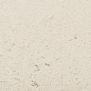Close-up of a textured beige surface