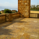 Tuscany Riviera Travertine Tumbled Paver Kits - MSI Collection room shot outdoor pillar view