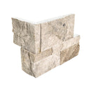 Decorative stone corner piece on a white background