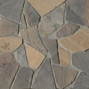 Close-up of a stone wall with varying shades of gray and brown.