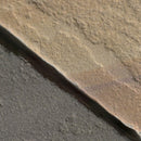 Close-up of a stone edge on a concrete surface