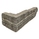 Stone block with a corner cutout on a white background