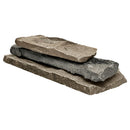 Three stone slabs of different sizes stacked on a white background