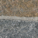 Close-up of two different stone textures, one brown and one gray.