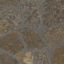 Close-up of stone pavement with varying stone sizes and colors.