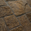 Close-up of stone tiles with a natural brown color and texture.
