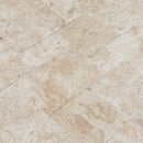 Light Antique Travertine Pattern Tumbled Pavers - Full Truckload wet look angle view