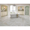 MSI Pietra Calacatta 24x24 marble look glazed porcelain floor wall tile NCAL2424 installed on a modern bathroom bathtub in the middle