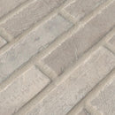 MSI brick collection capella ivory brick NCAPIVOBRI2X10 glazed porcelain floor wall tile product shot multiple brick angle view