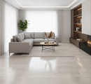 Modern living room with a gray sectional sofa, wooden coffee table, and decorative elements.