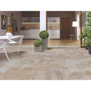 Mina Rustic Antique Pattern Brushed, Chiseled, and Partially Filled - Full Truckload installed to balcony with plants and white round dining table