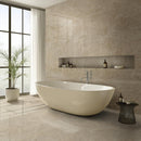Modern bathroom with a freestanding bathtub, shelves, and a plant.