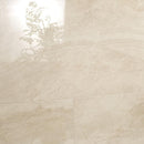 Beige tiles with a subtle pattern on a light background