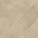 Beige tiles arranged in a herringbone pattern