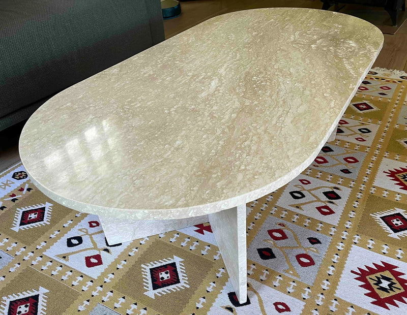 Oval shape coffee table travertine filled polished angle view