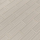 Portico pearl beveled 12X12 glossy ceramic mesh mounted mosaic tile SMOT-PT-PORPEA-2X6B product shot multiple tiles angle view