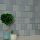 Renzo sky 5x5 glossy ceramic blue wall tile NRENSKY5X5 product shot multiple tiles living room wall view 1