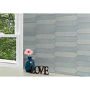 Renzo sky pickett 2.5x13 glossy ceramic blue wall tile NRENSKYPIC2.5X13 product shot multiple tiles living room wall view 3