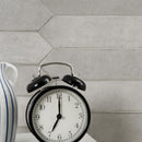 Renzo streling pickett 2.5x13 glossy ceramic gray wall tile NRENSTEPIC2.5X13 product shot multiple tiles closeup view