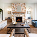 Riverrock Mixed Ledger 3D Panel 6"x24" Natural Marble Wall Tile - Full Truckload installed around fireplace with wooden mantel living room