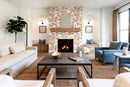 Riverrock Mixed Ledger 3D Panel 6"x24" Natural Marble Wall Tile - Full Truckload installed around fireplace with wooden mantel living room wide view