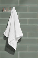 Prudent Spring 4"x12" Glass Subway Wall Tile room shot bathroom view