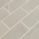 Sande grey 12x12 polished porcelain mesh mounted mosaic tile NSANGRE2X4P product shot multiple tiles angle view