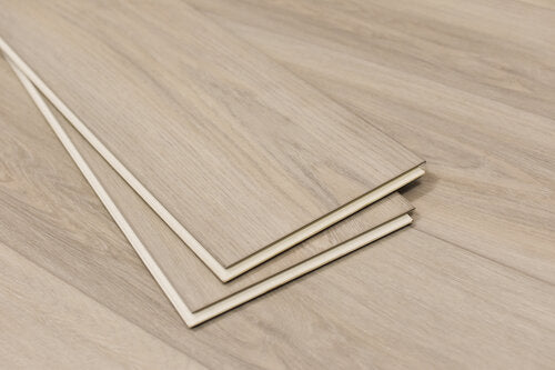WPC Vinyl Rigid Core 7" Width 60" RL, 9.5mm Thick, 1.5mm IXPE Satin Beige Domaine Floors - Mazzia Collection edge view