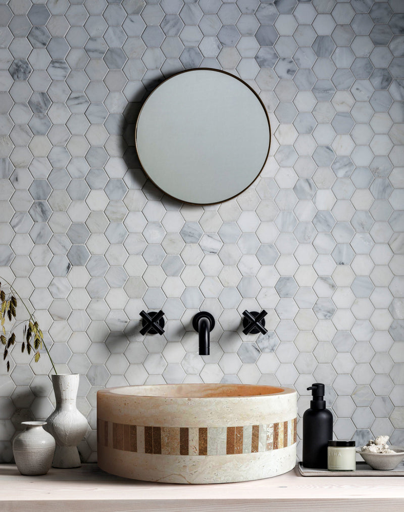 Troia Light Travertine Cylinder Above Vanity Bathroom Sink 2" Embedded Mosaics Border installed bathroom above vanity round black framed mirror hexagon marble wall mosaic tiles