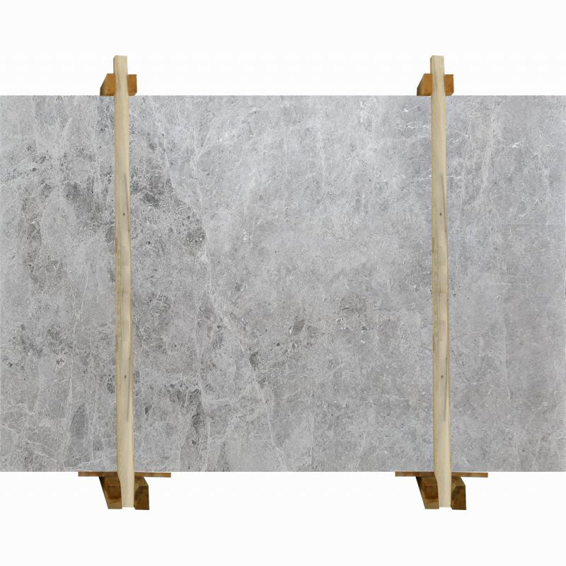 Tundra Grey marble slabs polished packed on wooden bundle product shot