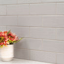 Urbano dusk 3d mix ceramic gray textured subway tile 4x12 glossy  NURBDUSMIX4X12 room shot table view 2