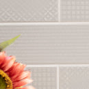 Urbano dusk 3d mix ceramic gray textured subway tile 4x12 glossy  NURBDUSMIX4X12 room shot table view 4