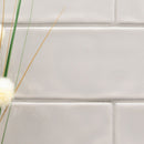 Urbano dusk ceramic white subway tile 4x12 glossy  msi collection NURBDUS4X12 room shot table view 5