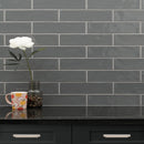 Urbano graphite ceramic gray subway tile 4x12 glossy NURBGRA4X12 product shot table view 3