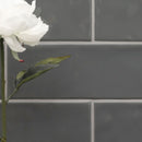 Urbano graphite ceramic gray subway tile 4x12 glossy NURBGRA4X12 product shot table view 5